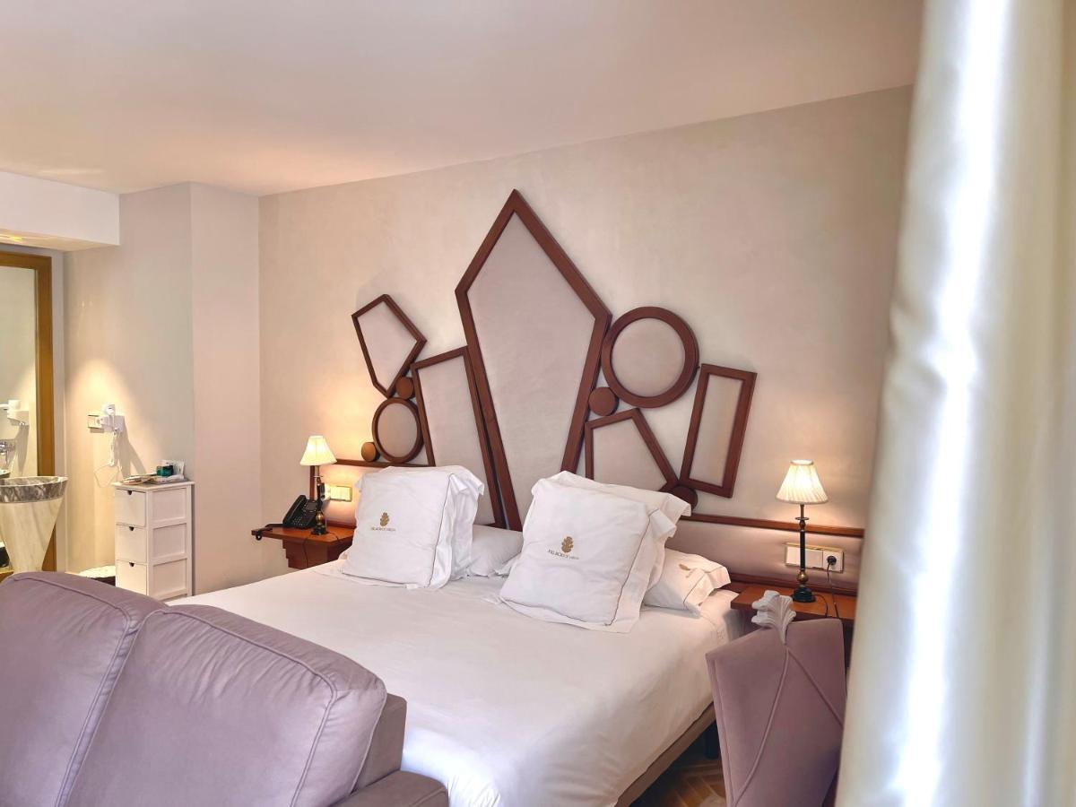 Hotel Palacio De Ubeda 5 G.L Dış mekan fotoğraf A bedroom at the hotel